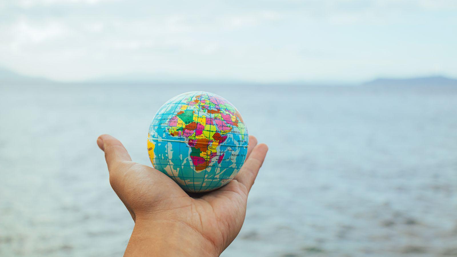 A globe wrapped in network routes